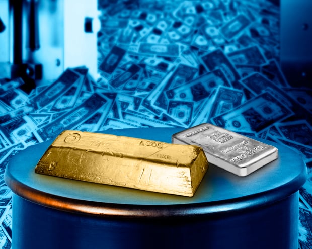 A bar of gold, a bar of silver and stacks of banknote in the background