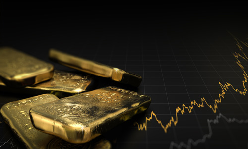 Gold bars with chart of gold price in the background